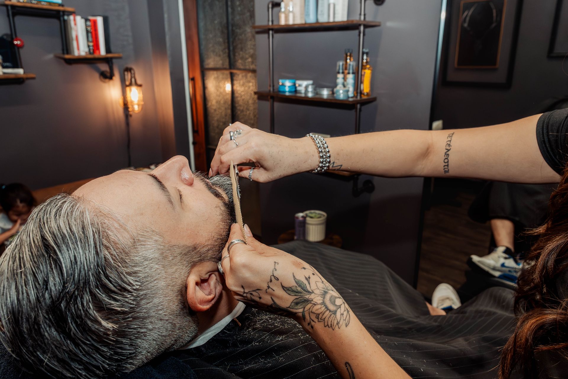 Hot lather neck shave with straight razor at The Speakeasy Barber, Austin
