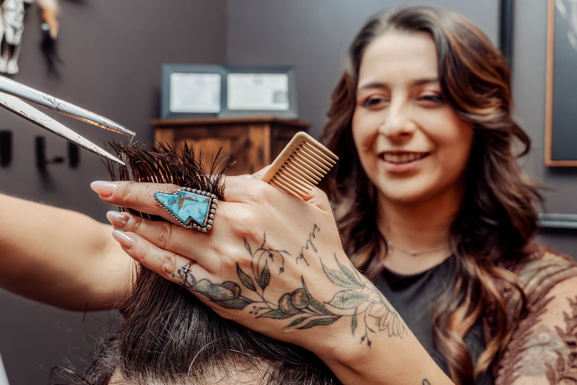 Precision scissor work on a men's haircut at The Speakeasy Barber, Austin